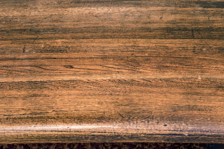 detail of pew seat with laminate oak strips